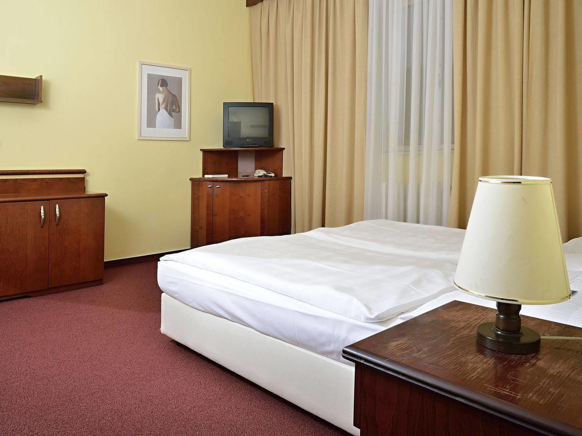 Dvoulůžkový pokoj Comfort s manželskou postelí